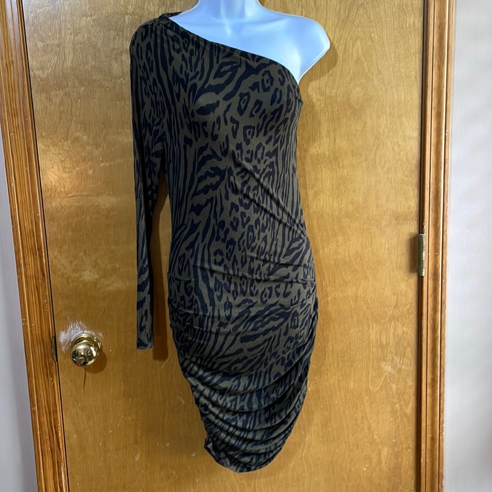 Women’s asymmetrical one sleeve knit ruched dress.